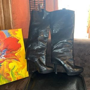 Nine West black leather knee length boot with 5’ heel. Sz.7